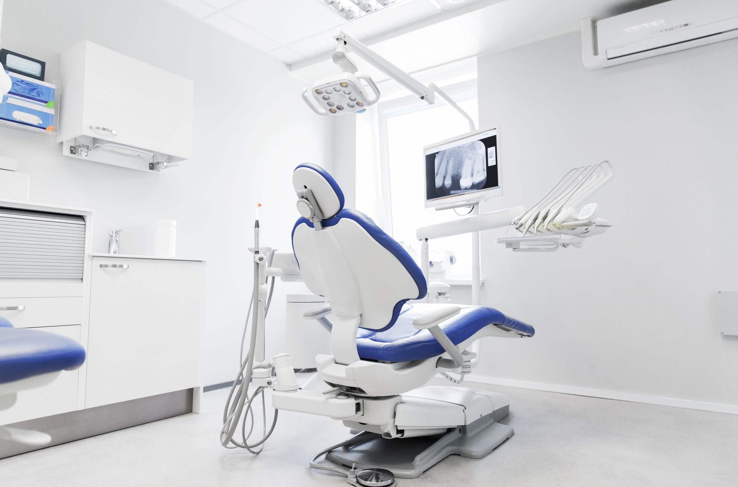 Image of Dental chair with the words IT Support Company HIPAA Compliance